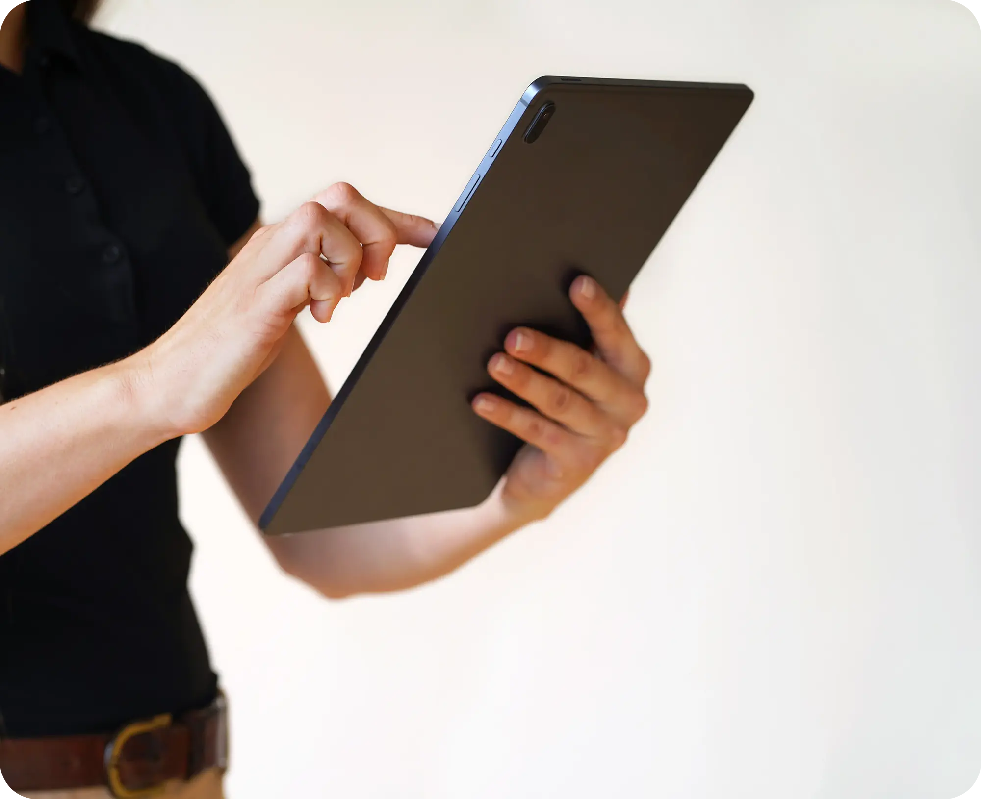 person using a form on an ipad